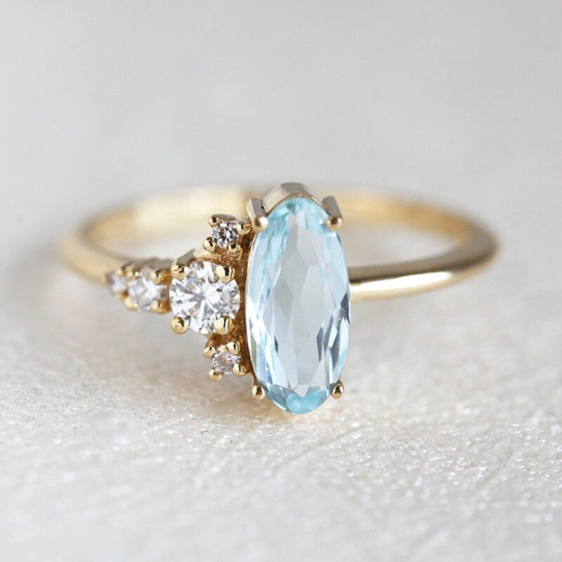 oval-diamond-aquamarine-ring